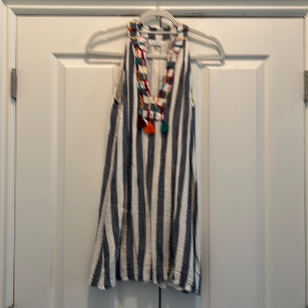 Cute navy and white striped dress with embroidered neckline.